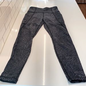 Athleta Salutation stash pocket tight.  Size XS